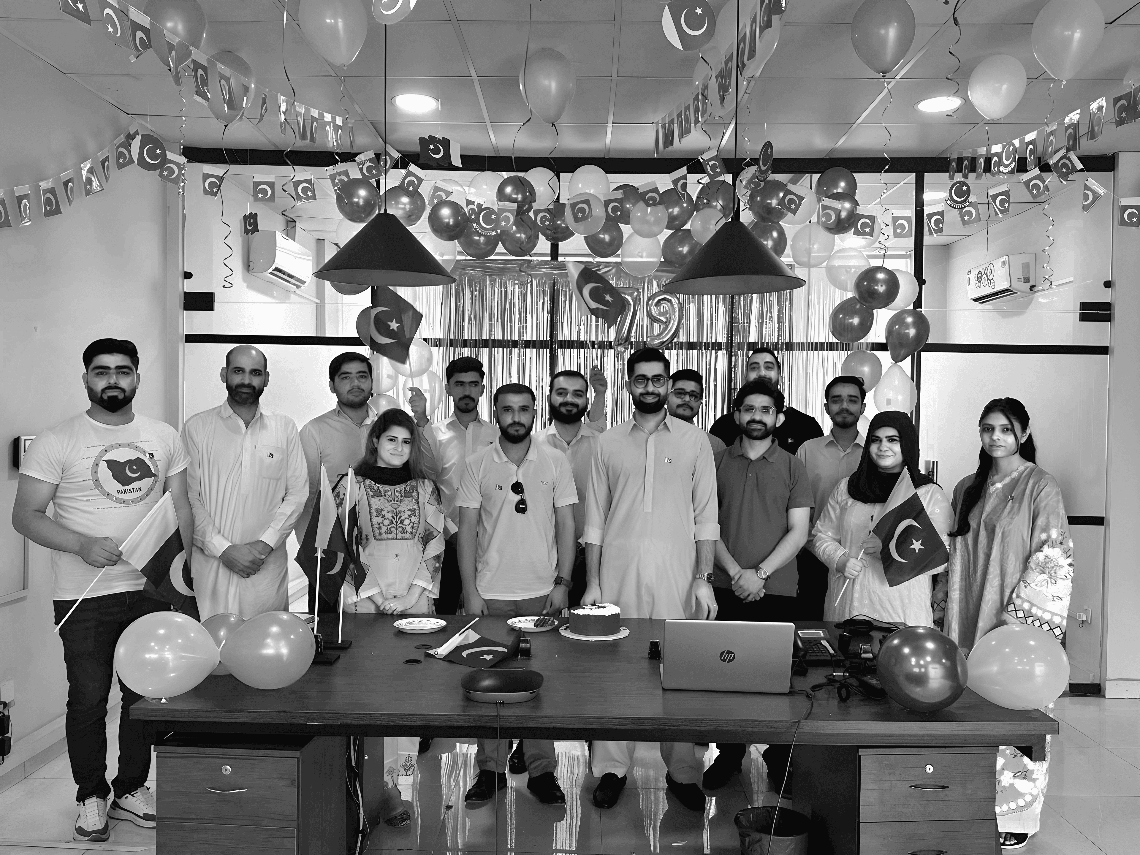 The PaySa team celebrating together at the office